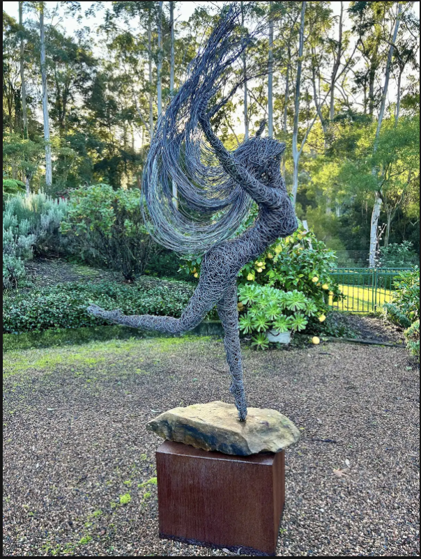Wire dancer sculpture in the retreat grounds